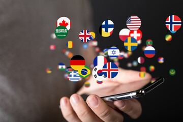 Poster - Person holding phone with floating flags, representing international communication and translation.