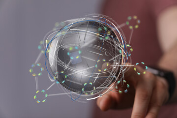 Poster - High-tech image depicting a futuristic digital globe, data streams, and network connections.