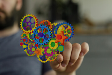 Poster - Abstract image of colorful gears representing teamwork, innovation, and technology.