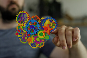 Poster - Image of colorful gears symbolizing innovation, technology, and teamwork. Perfect for business and technology concepts.
