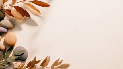 Poster - A serene arrangement of colorful pebbles and dried leaves on a soft beige background