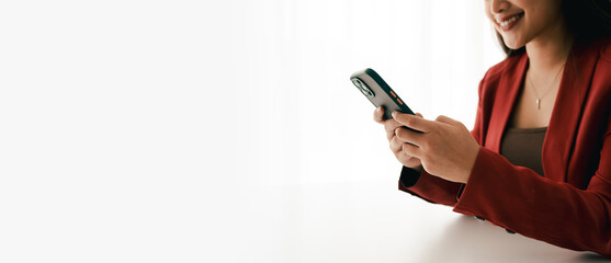 Wall Mural - portrait of a young woman holding a mobile phone to use social media on a smartphone. communicate vi