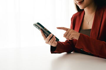 Wall Mural - portrait of a young woman holding a mobile phone to use social media on a smartphone. communicate vi