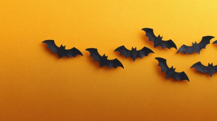 Poster - Flat lay of black bats flying on orange paper with open copy area