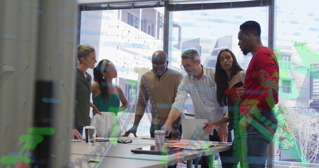 Poster - Leaning six professionals examining laptop screen and papers at conference table, data overlays
