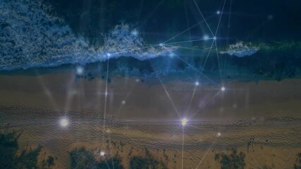 Poster - On load aerial view showing coastline, digital network pulsing, reshaping, dissolving into sparkles