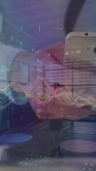 Poster - Animation of graphs over hands of caucasian businessman using smartphone