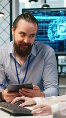 Fototapete - Vertical video Mentor teaching young employee to troubleshoot software errors using AI. Manager doing induction to newcomer junior dev using computer to write code, developing machine learning APIs