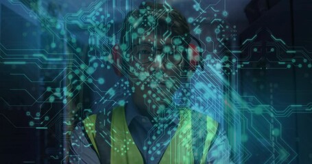 Poster - IT technician wearing earmuffs vest in server corridor starting circuit overlay mapping diagnostics