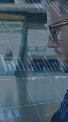 Poster - Animation of multiple graphs with changing numbers, caucasian photographer checking camera