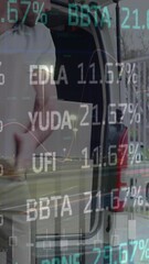 Poster - Animation of financial data processing over delivery man loading up car outside of warehouse