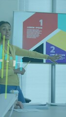 Poster - Animation of graphs over diverse female explaining strategy on screen to coworkers in office