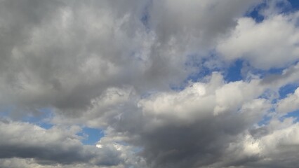 Wall Mural - photo of sky covered with partly clouds. 