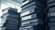 © Emi - Stacks of binders and paper organized in an office setting showcasing administrative tasks