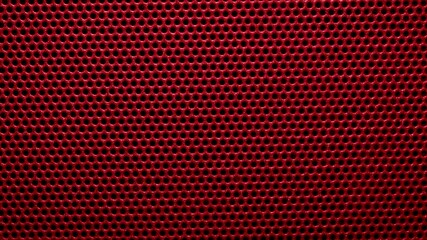 Closeup of a  red metal grid. texture or background