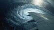 © Santi - An incredible aerial view of a powerful hurricane. The airplane's wing is visible, offering a unique perspective on the formidable weather system.