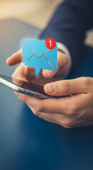 Poster - Hands hold smartphone, a blue email notification icon with a red 