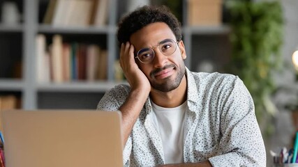 Poster - Contented Professional at Workspace: An african descent man, exuding a sense of composure and ease, works at a workspace, embodying both dedication and contentment.