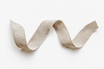 Aufkleber - Softly curled linen strip on white background, natural texture and neutral color create calm and minimalistic style, perfect for craft or design inspiration