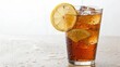 © Alam - Refreshing iced tea with lemon slice and ice cubes in a clear glass, perfect for a hot summer day