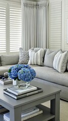 Poster - Modern furnishings and beautiful blue flowers create a serene atmosphere in this stylish living room setting, perfect for relaxation