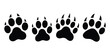 © MDABDUS - Claw Footprint Marks Four Black Animal Paw Prints with Claws on White