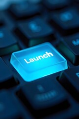 Poster - Glowing Blue Launch Button on a Dark Keyboard, vertical composition. A closeup shot ideal for technology, startup, and innovation concepts.