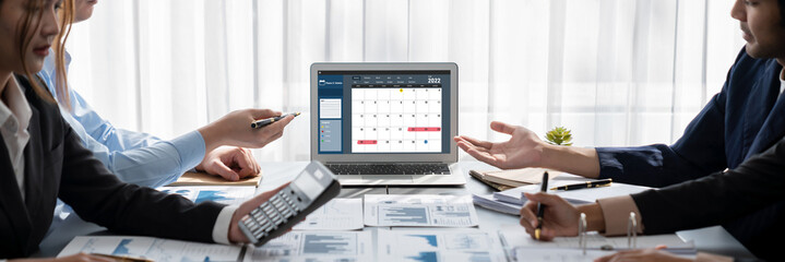 Poster - Business intelligence and data analysis concept. Analyst team working on financial data analysis dashboard on laptop screen as marketing indication for effective business strategic planning. Insight