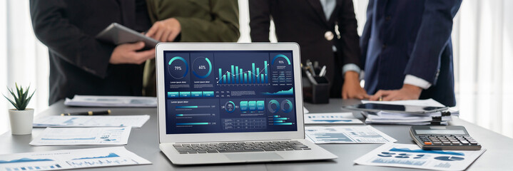 Poster - Panorama shot analyst team utilizing BI Fintech to analyze financial report with laptop. Businesspeople analyzing BI data dashboard displayed on laptop screen for business insight. Prodigy