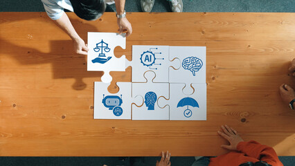 Poster - A dynamic teamwork scenario displaying a group designing a puzzle that represents ethical considerations in artificial intelligence and technology, fostering discussion. Amity