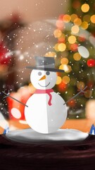 Poster - Animation of snow globe with snowman and christmas baubles over snow falling and text