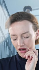 Poster - Animation of spots and caucasian woman over african american female doctor with face mask