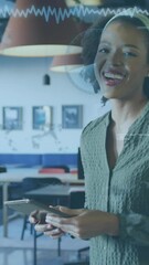 Poster - Animation of data processing over african american woman using digital tablet and smiling at office