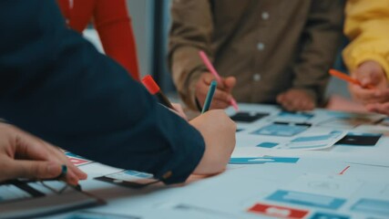 Poster - A dynamic team collaborates on a mobile application design project, showcasing colorful sketches and prototypes on the table, fostering creativity and innovation. SACTR