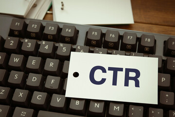 Poster - There is word card with the word CTR. It is an abbreviation for Click Through Rate as eye-catching image.