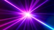 © Saksit - Bright purple and blue laser beams radiate from a central white light source against a dark background.