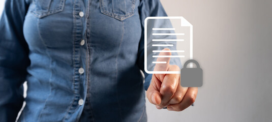 Poster - Close-up of a woman's hand pressing on a document icon with a padlock sign in a virtual screen for data protection and process.