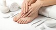 © RisaFitri - Elegant spa pedicure and manicure concept with hands, feet, and beauty accessories