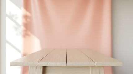 Poster - Light wood table against soft pink backdrop with window light image