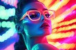 © Iftikhar alam - Woman with neon makeup and glasses against vibrant background in a nighttime setting, Woman with neon makeup and glasses against vibrant abstract background