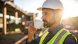 © zerogami - Construction worker enjoying coffee break on site with relaxing in the sunlight.