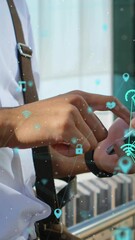 Poster - Animation of connected icons globes over midsection of man scrolling on smartphone