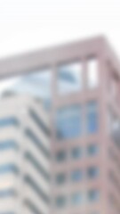 Poster - Animation of hanging silver house keys against blurred view of tall buildings