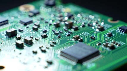 Poster - Green Circuit Board with Black Microchips Detailed Macro View Electronic Components And Soft Lighting