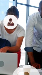 Poster - Animation of profile icons over diverse coworkers discussing reports on laptop and digital tablet