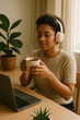 © Ionut - Young African American woman relaxing with headphones and hot beverage at home office desk