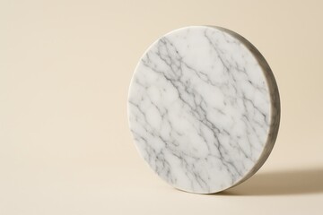 Poster - Elegant circular marble texture with subtle veining and soft shadows against a solid neutral background provides sophistication