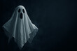 © MichaelBima - A traditional white sheet ghost floats ominously against a dark, misty background. The wide-open black eyes and mouth give it a startled expression, embodying the iconic Halloween ghost.
