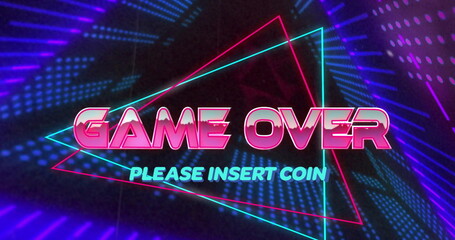 Poster - Neon arcade screen displaying glowing GAME OVER text and triangular outlines in dark gaming setup