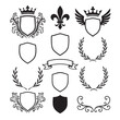 © ATM - Vintage gold royal heraldic shield vector illustration set with crown, ribbon, and laurel wreath design